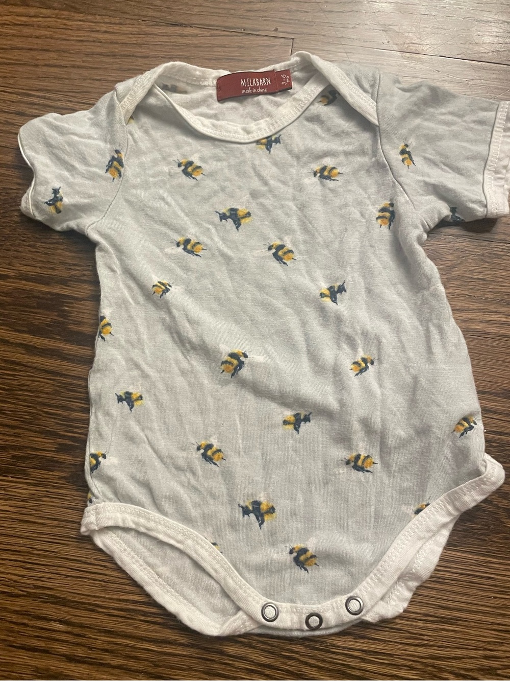 Milkbarn White Baby One-Piece with Bee Print